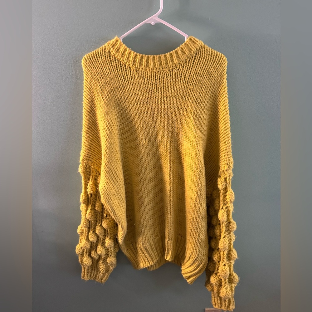 These Three sweater